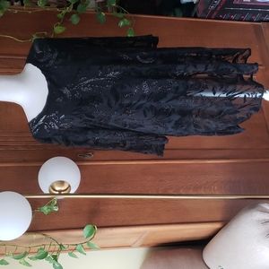 Elegant fun black sparkly lined tunic